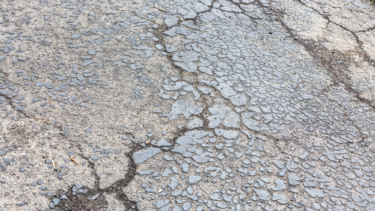 pavement driveway with cracks